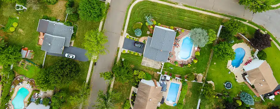 American small town with houses and roads on aerial view landscape in New Jersey USA