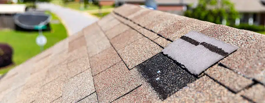 Roof damage after storm.